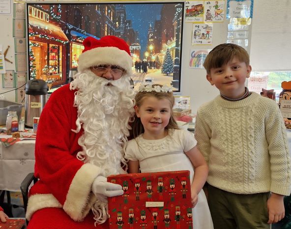 Children meeting Santa at school